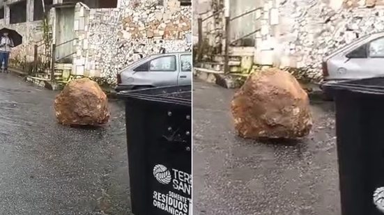Pedra se desprendeu do Morro São Bento e caiu em uma rua de Santos nesta quarta-feira (23). Ninguém ficou ferido - Imagem: Reprodução