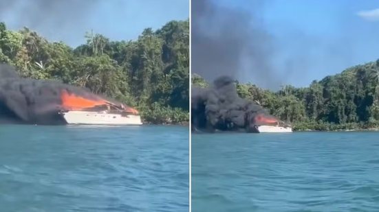 ancha com 18 pessoas a bordo pegou fogo a cerca de 200 metros da Praia do Iporanga, em Guarujá; todos os ocupantes foram retirados e ninguém ficou ferido. - Imagem: Reprodução / Redes Sociais