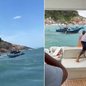 Barco pesqueiro é resgatado por outras embarcações após ficar à deriva próximo a pedras durante mudança repentina no tempo em Guarujá - Imagem: Pedro Dias