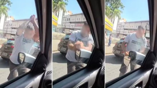 Motorista é flagrado quebrando retrovisor de carro durante discussão no trânsito em São Vicente - Imagem: Reprodução