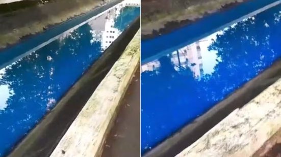 Moradores registraram a água do Canal 4, em Santos, com coloração azul fluorescente; equipes da Prefeitura não encontraram vestígios da alteração no dia seguinte. - Imagem: Reprodução / g1 Santos