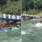 Equipes de resgate atuam após canoas havaianas serem levadas pela correnteza na região da Ilha das Palmas, em Guarujá - Imagem: Adriano Neris