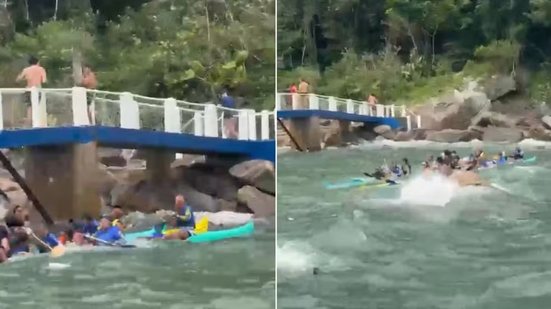 Equipes de resgate atuam após canoas havaianas serem levadas pela correnteza na região da Ilha das Palmas, em Guarujá - Imagem: Adriano Neris