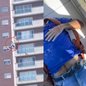 Trabalhador, de 51 anos, ficou pendurado no 11º andar após desmaiar durante manutenção; enfermeiro foi essencial no socorro - Imagem: Reprodução /  Foto: Bruno Canavezzi