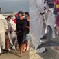Banhistas e guarda-vidas resgatam golfinho encalhado na praia da Aviação, em Praia Grande - Imagem: Divulgação