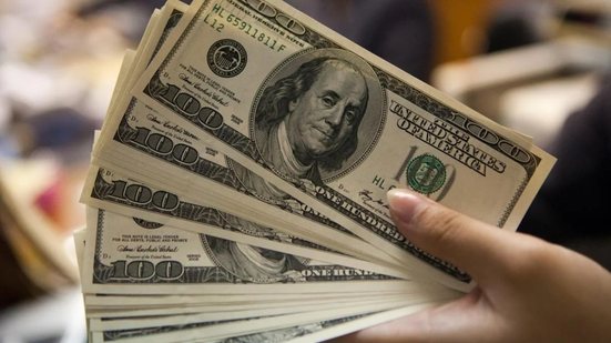O dólar abre a sessão em leve queda, enquanto investidores aguardam dados de inflação e política monetária - Imagem: Divulgação