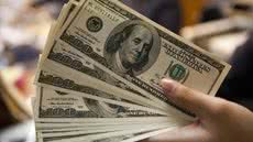 O dólar abre a sessão em leve queda, enquanto investidores aguardam dados de inflação e política monetária - Imagem: Divulgação