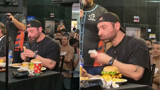Ricardo Corbucci concluiu em 22 minutos e 39 segundos o desafio de consumir 5 kg de fast food em São Vicente, no litoral de São Paulo. - Imagem: Reprodução
