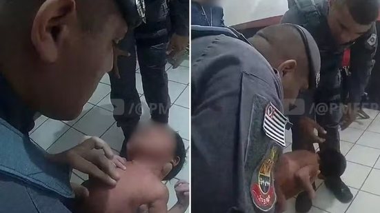 Policiais militares realizaram manobras de desengasgo em um bebê de um mês após a mãe procurar ajuda em uma base comunitária na Vila Zilda, em Guarujá, na noite de quarta-feira (14) - Imagem: Reprodução