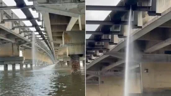 Vazamento em tubulação sob a Ponte do Mar Pequeno, em São Vicente, foi registrado por um morador que afirma acompanhar o problema há meses. A Sabesp programou o início dos reparos para terça-feira (22) - Imagem: Paulo Luiz Bárbara Lourenço