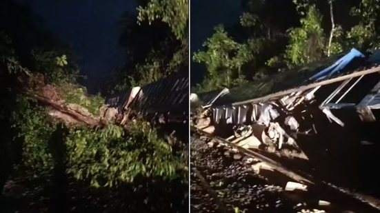 Seis vagões de um trem tombaram após a queda de uma barreira na ferrovia em Paraitinga, em São Vicente, durante as fortes chuvas desta segunda-feira (14). - Imagem: Reprodução